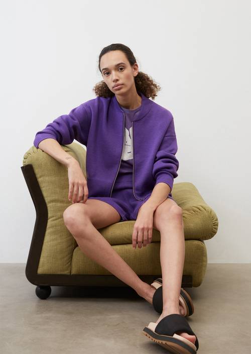 Oversized zip-up cardigan purple glow in front view