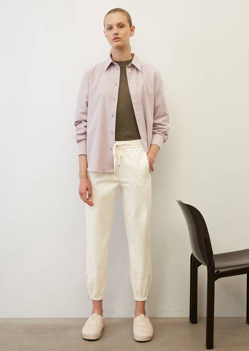 Elegant jersey tracksuit bottoms with a zip fly in smooth