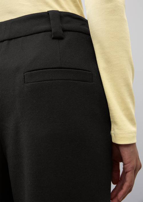 Trousers with a straight leg black in detail view