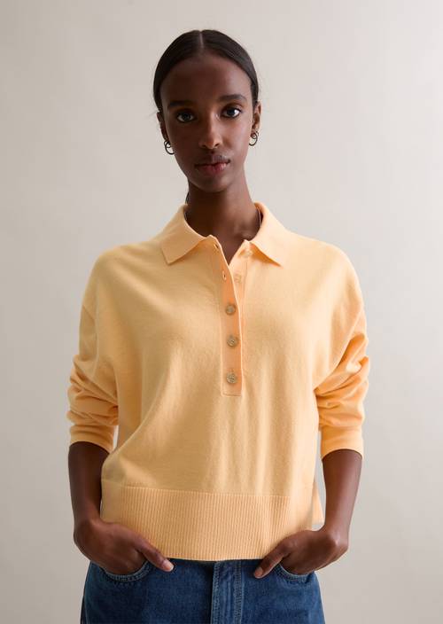 Relaxte gebreide polo Medium Orange in vooraanzicht