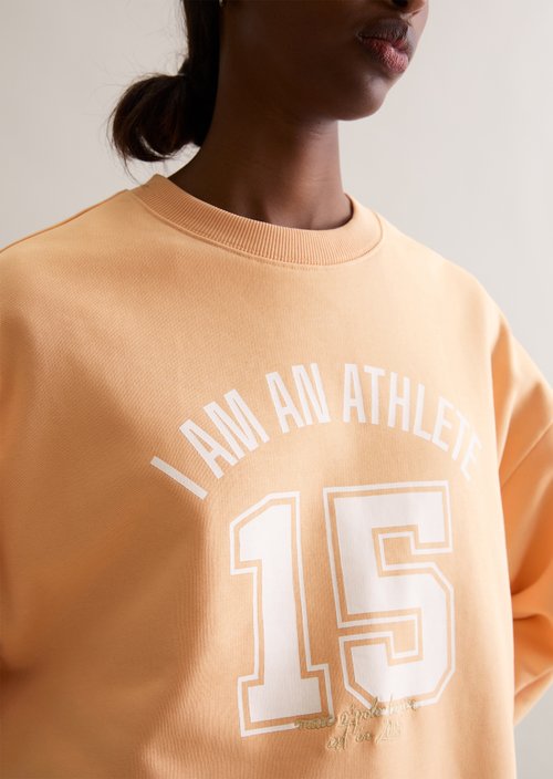 College-style relaxed sweatshirt — Bleached Apricot