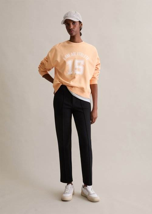 College-style relaxed sweatshirt — Bleached Apricot