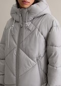 Long hooded quilted jacket relaxed made from recycled polyester