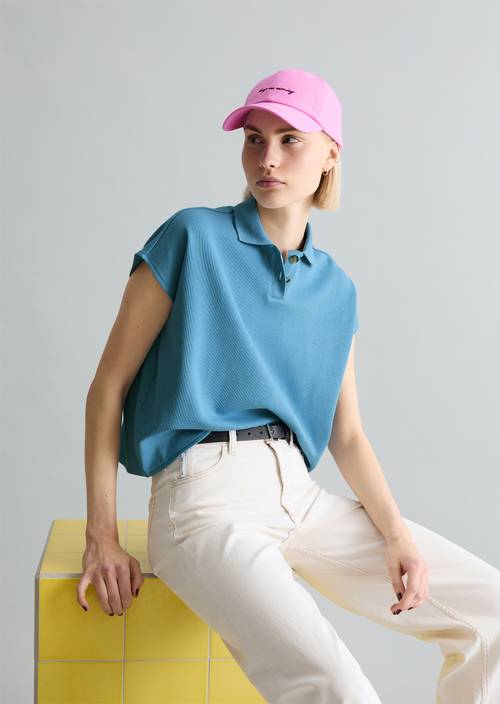 Polo sans manches wide Blue Dawn en vue de face