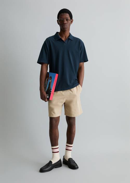 Poloshirt Piqué relaxed Navy Teal in Frontalansicht