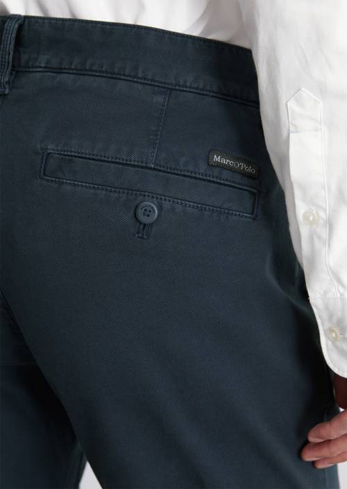 Chino model Stig shaped Navy Teal in detail view