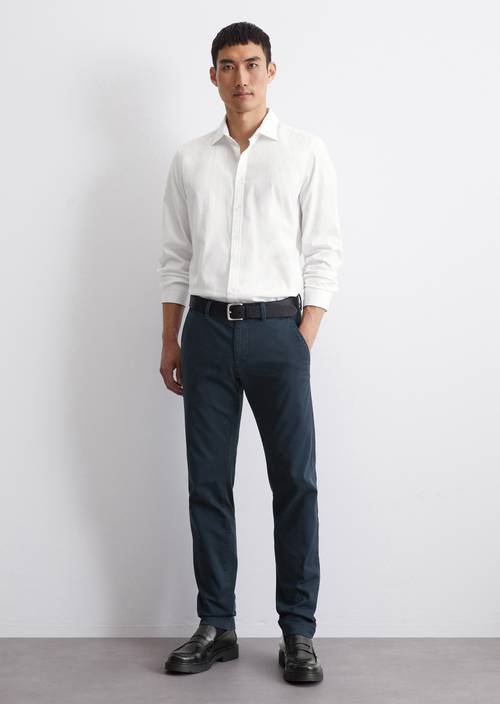 Chino model Stig shaped Navy Teal in front view