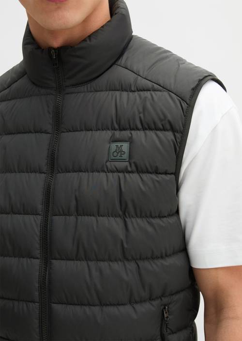 Regular quilted vest Black in detail view