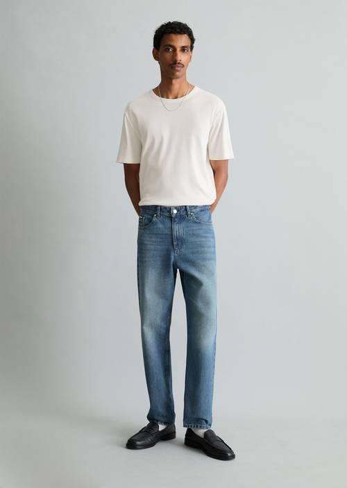 Jeans modèle Runne tapered Medium Blue en vue de face
