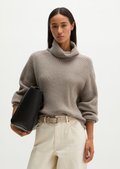 Ribbed turtleneck sweater loose made from a soft virgin wool blend