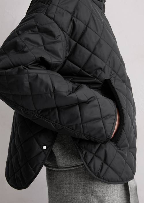 Relaxte gewatteerde jas met capuchon Black in detailaanzicht