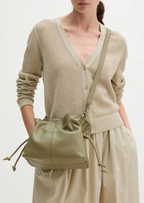 Shoulder bag model Simona small Pure Sage worn on model