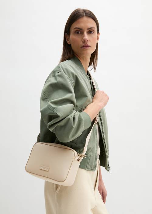 Camera-Bag small Linen Beige worn on model