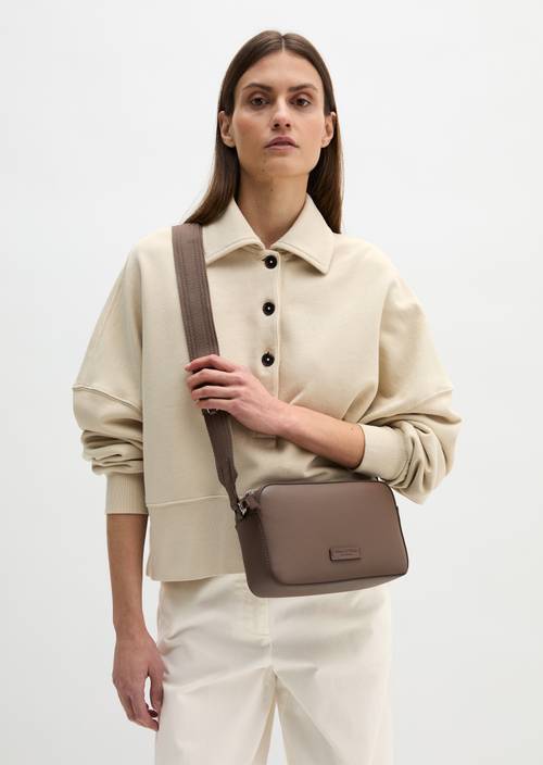 Camera-Bag small Faded Brown worn on model