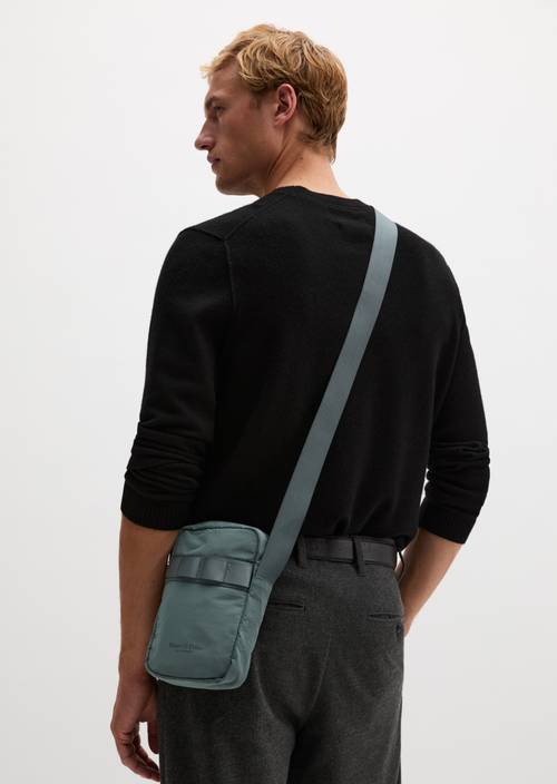 Lore Small Crossbody Bag Skipping Stone worn on model
