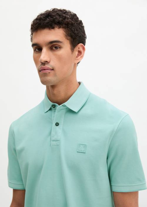 Poloshirt Piqué regular  garment-dyed Midnight Moss in Frontalansicht