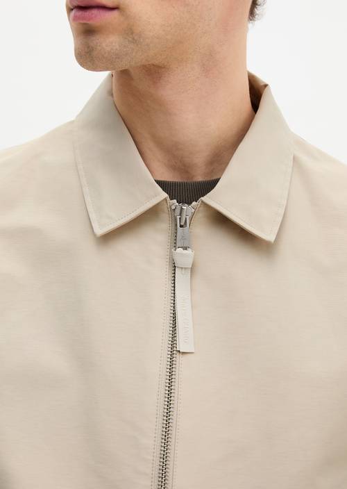 Chaqueta con cremallera regular Light Oat en vista detallada