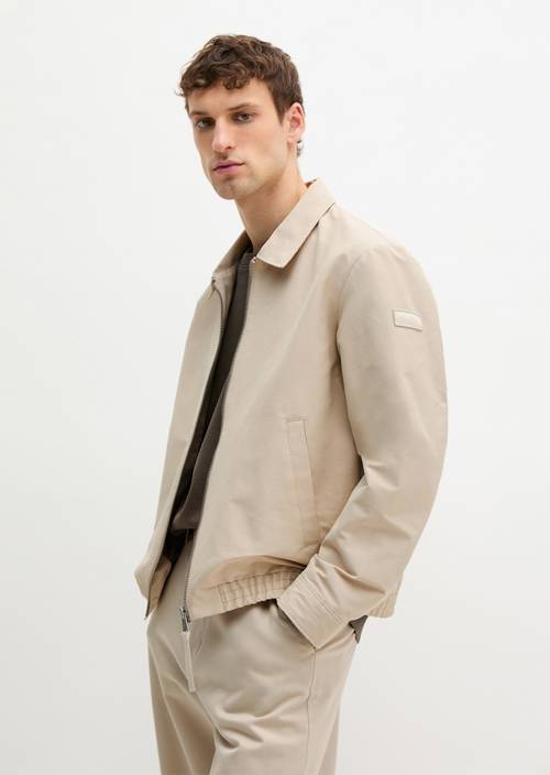 Chaqueta con cremallera regular Light Oat en vista frontal