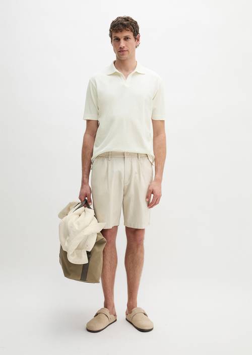 Pantaloncini modello Eksjö jogger pieghe rilassate Light Oat in vista frontale