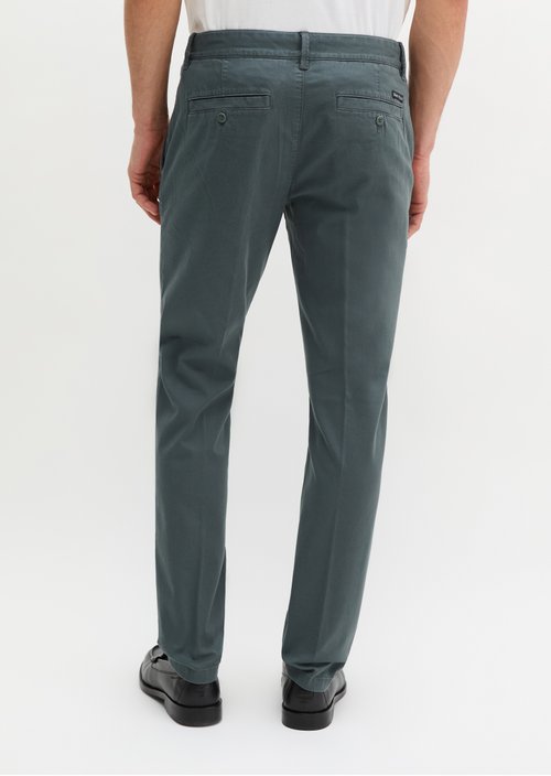 Chino model Stig shaped — Skipping Stone