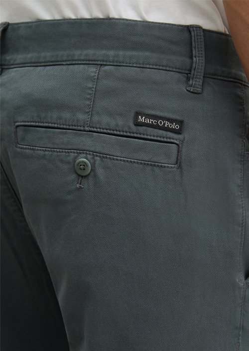 Chino model Stig shaped — Skipping Stone