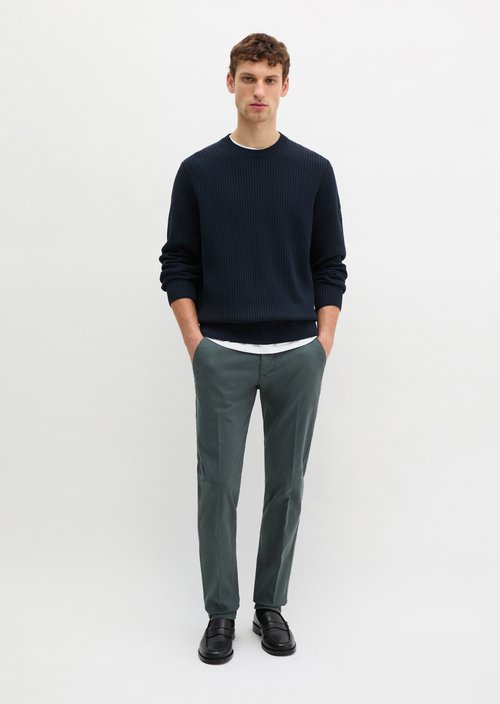 Chino model Stig shaped — Skipping Stone