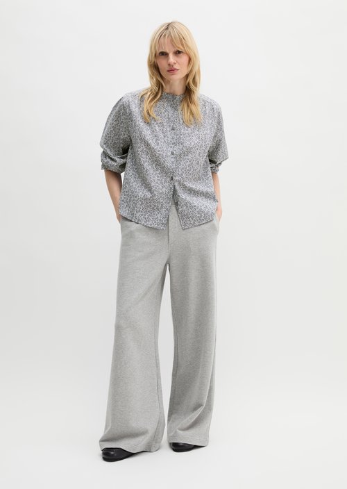 Ruffled loose blouse — Light Blue