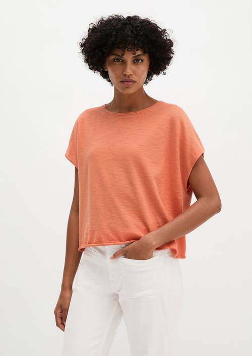 Mouwloze fijn gebreide trui los Warm Orange in vooraanzicht