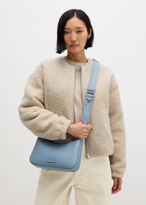 Vena Shoulder Bag Clear Blue worn on model