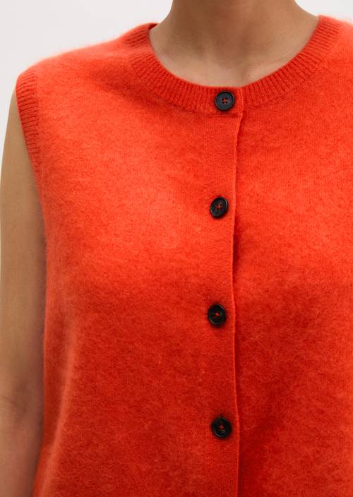 Mouwloos slim-fit vest Vivid Orange in detailaanzicht