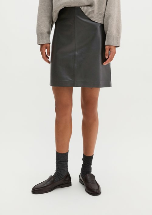 Flared leather miniskirt in a wrap style — Black