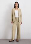 JIGGLY KNIT Top Beige – ISSEY MIYAKE EU