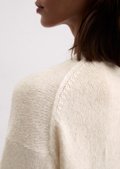 Loose knit sweater made from a soft virgin wool blend