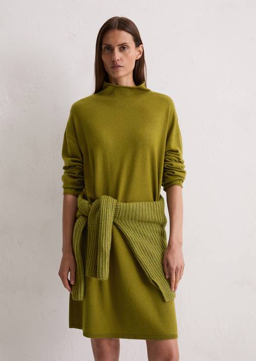 Relaxed fine knit sweater dress made from a soft virgin wool blend