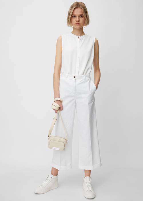 Mini cross-body bag M810 worn on model