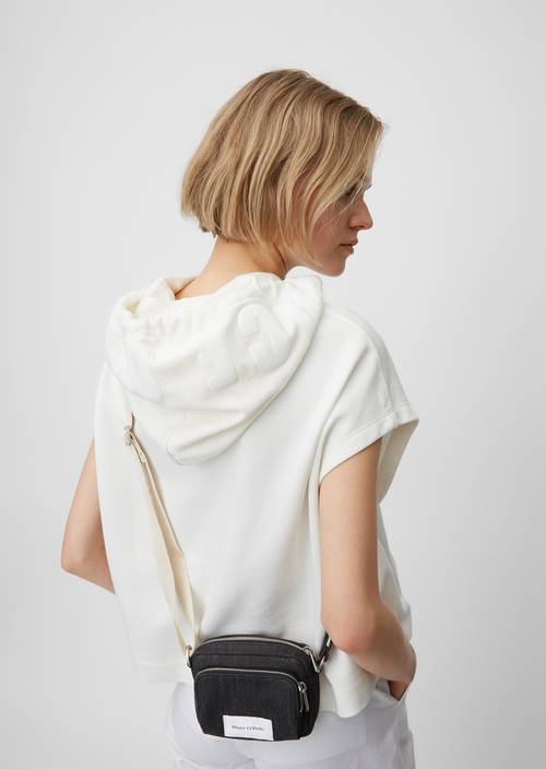 Mini cross-body bag M880 worn on model