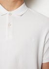 Piqué shaped polo shirt made of organic stretch cotton Piqué shaped polo shirt made of organic stretch cotton